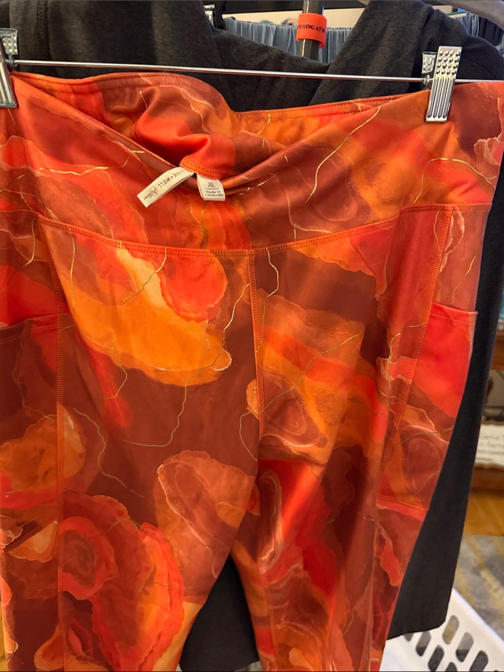 Active USA Floral-Print Women’s Athletic Capris in Orange & Red.